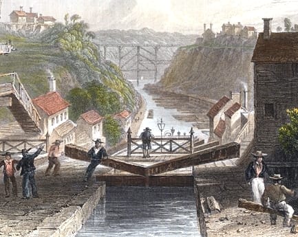 A 19th-century colored engraving of canal boats climbing a double flight of stone locks at Lockport on the Erie Canal.