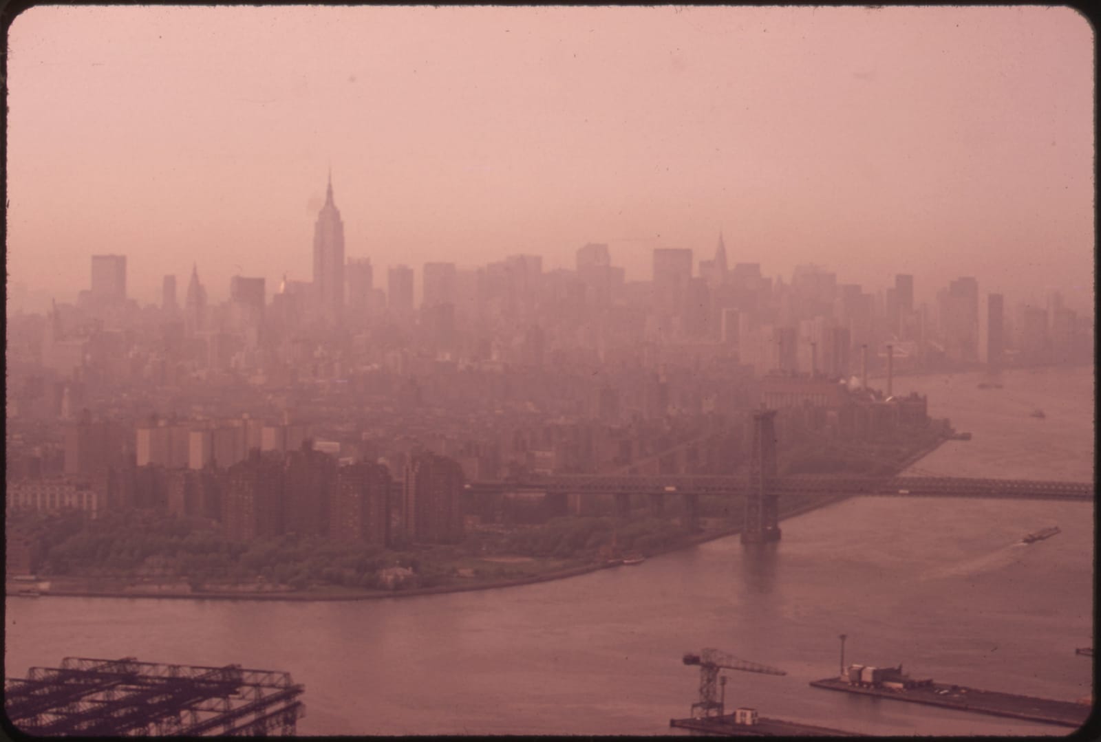 The Lower Manhattan skyline and the Brooklyn Bridge across the East River in 1973, New York in the years of its fiscal crisis.