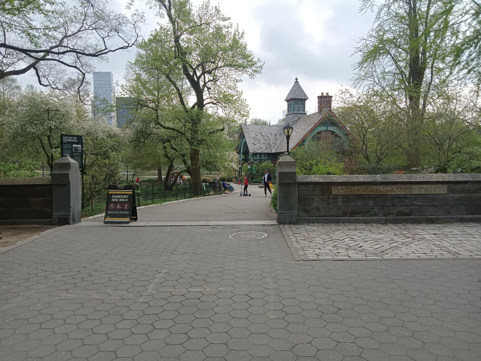 A stone entrance gate at the north end of Central Park, renamed the Gate of the Exonerated in honor of the five men wrongfully convicted in the 1989 jogger case.
