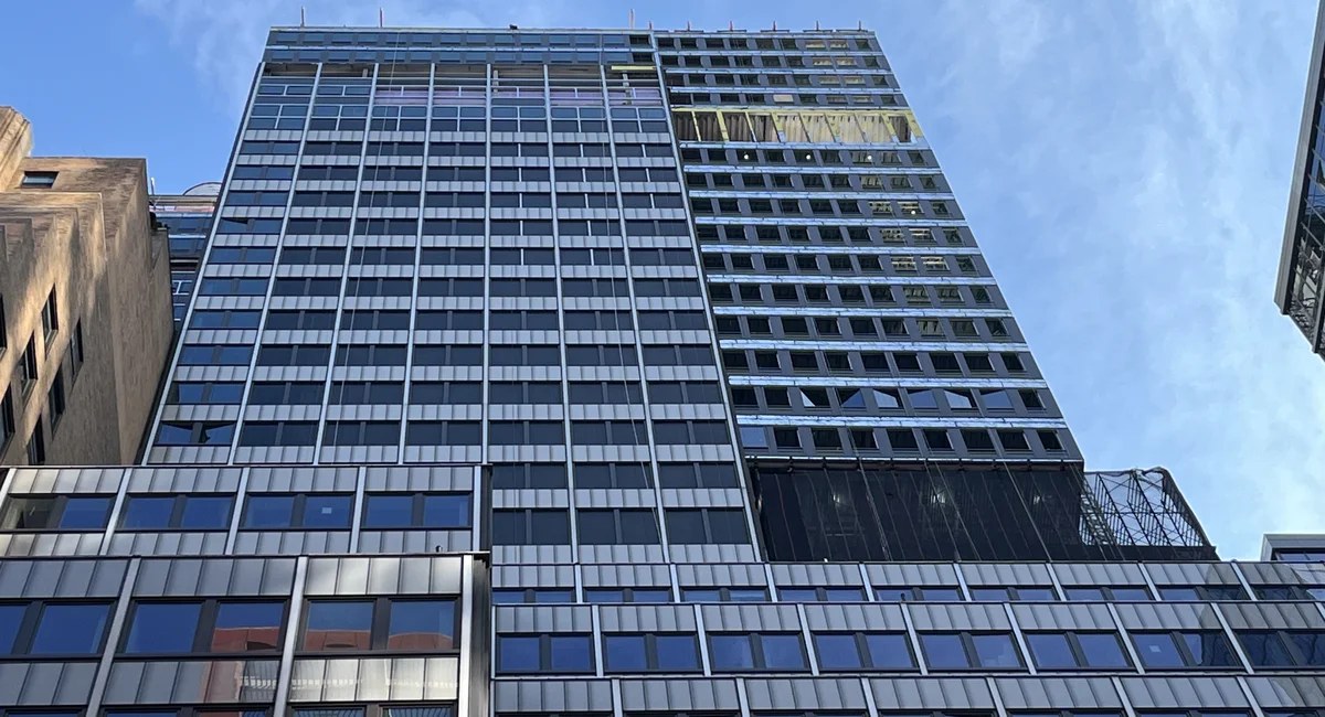 Lifting the Pfizer Building, a business card at a time